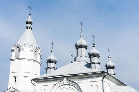 Orthodox church roof background. Metal domes with cross landscape. Religious building architecture...