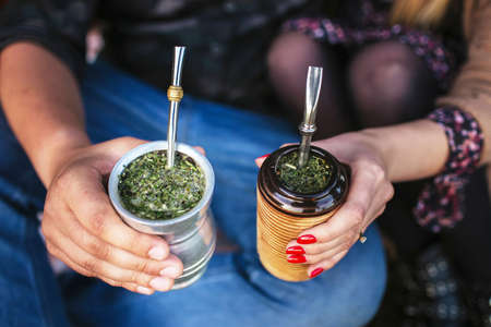 Close-up of a joint in the hands of a man and a womanの写真素材