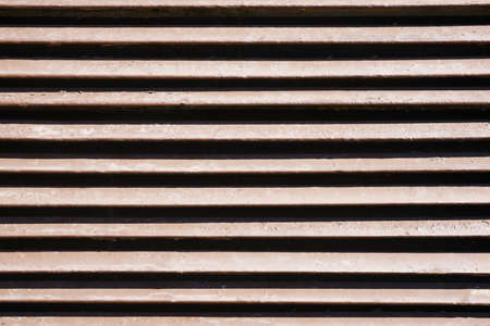 Close-up of a brown wooden blinds. Background and texture.