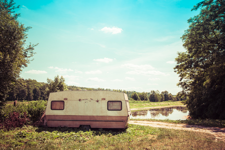 The caravan is standing on the side of the roadの写真素材