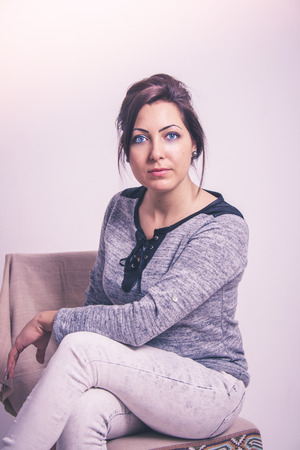 Sitting woman portraitの写真素材