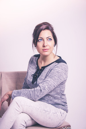 Sitting woman portraitの写真素材