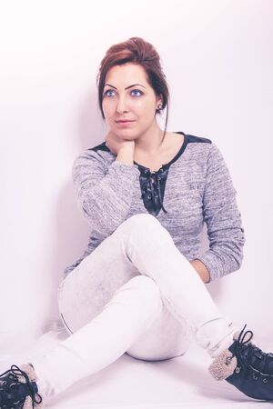 Sitting woman portraitの写真素材