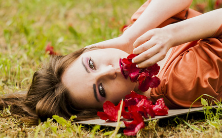 Sexy Model lying on grassの写真素材
