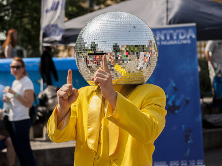 Szczecin, Poland - Mai 23, 2014 Disco Ball Man dancing in the street   のeditorial素材