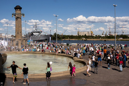 SZCZECIN, POLAND - JUNE 15, 2014  Sail Szczecin 2014 The tall masts of sailing ships fill the harbour for a wonderful three day event perfect for families and those who are sailors at heart View of ships and visitors at Chrobry Embankment のeditorial素材