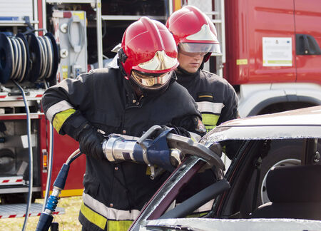 SZCZECIN, POLAND - JULY 08, 2014:Fire and Rescue Emergency Units in action, at car accident.