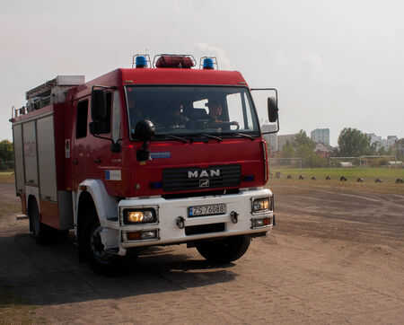 SZCZECIN, POLAND - JULY 08, 2014:Polish fire engine truck running during a mission