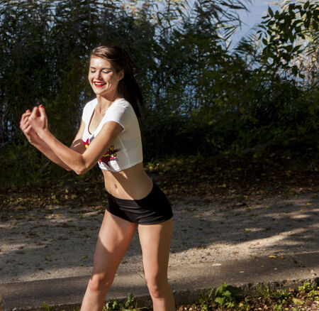 WAGRAWIEC, POLAND - JUNE 21, 2014: Attractive woman dancing during shooting music video clip of the polish Disco band Juradのeditorial素材
