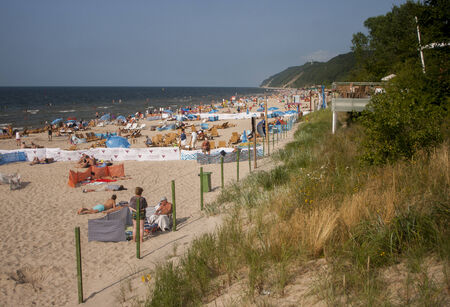 MIEDZYZDROJE, POLAND - JULY 16, 2014: Miedzyzdroje, vacation town in Poland.Beach on the Baltic seaのeditorial素材