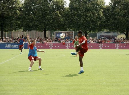 MUENCHEN, GERMANY - AUGUST 18, 2015: Players of Bayern Muenchen at a training session of their team.のeditorial素材