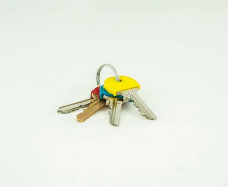 Bunch of keys isolated over white backgroundの写真素材