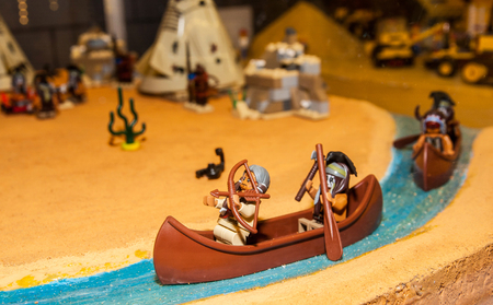SZCZECIN, POLAND - FEBRUAR 27, 2016: Indian canoe with two indians made by Lego blocks. Lego is a popular line of construction toys popular with kids and collectors worldwide.のeditorial素材