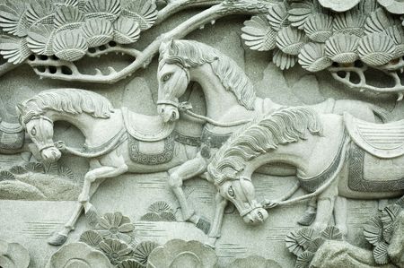 Carving on buddhism temple wallの写真素材