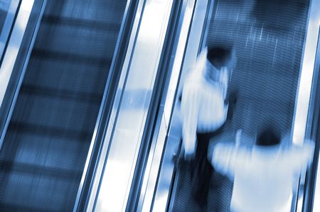 People motion blurred at elevator to airportの写真素材