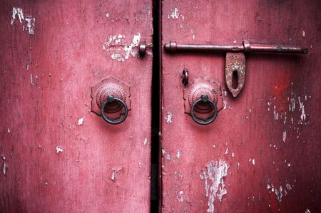 Grunge ancient red old doorの写真素材