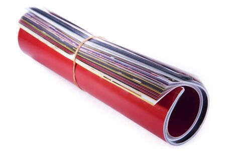 Roll of magazine, isolated on white backgroundの写真素材