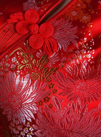 Closeup oriental cheongsam, focus on the button.の写真素材