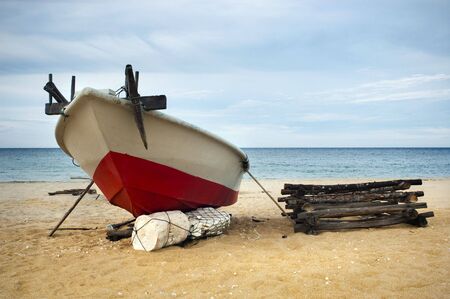 A boat on Marang beach, Terengganu, Malaysia.の写真素材