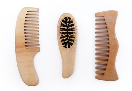 Wooden comb for hair on plain background.の写真素材
