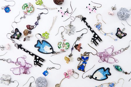 Different design earings on plain backgroud.の写真素材