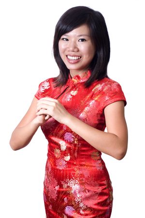Oriental girl wishing you a happy Chinese New Year.の写真素材