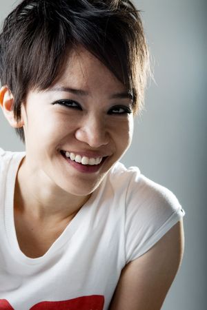 Close up Smiling Japanese Rock Girl Portraitの写真素材