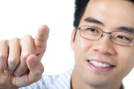 Asian business man pressing on a blank spaceの写真素材