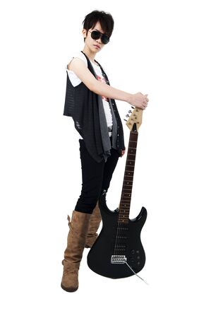 Punk Rockstar holding a guitar isolated in whiteの写真素材