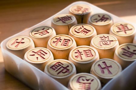 A Chinese Chess Set on a table with natural sunlight.の写真素材