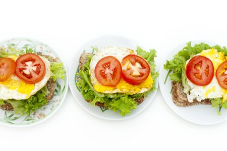 Fresh egg sandwich on plate in rowの写真素材