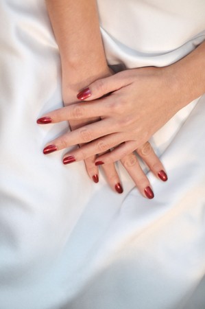 Close up beautiful bride's hands in wedding day.の写真素材