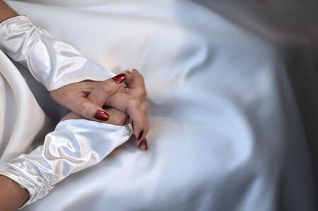 Beautiful bride's hands in her wedding day.の写真素材
