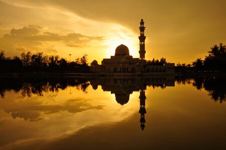 Masjid Tengku Tengah Zaharah or also known as Floating Mosque in Kuala Terengganu, Malaysia with reflection の写真素材