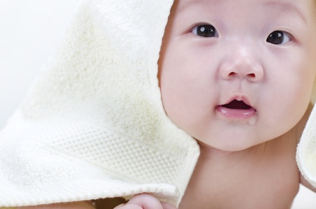 Curious Asian Baby is droolingの写真素材