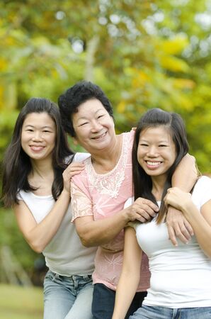 Happy Asian Senior lady and her daughtersの写真素材