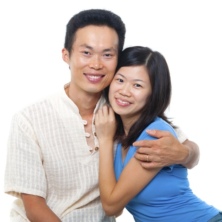 Loving Asian Couple on white backgroundの写真素材