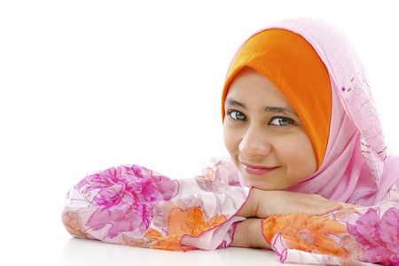 Pretty muslim woman smiling, on white backgroundの写真素材