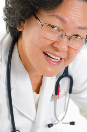 Asian senior female doctor smilingの写真素材