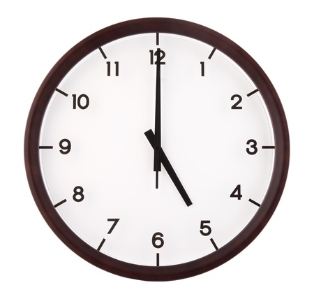 Classic analog clock pointing at 5 o'clock, isolated on white background