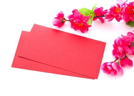 Chinese new year festival decorations on white background, the character on red packet or ang pow means prosperous.の写真素材