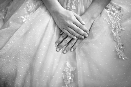 Close up beautiful bride hands in wedding day.の写真素材