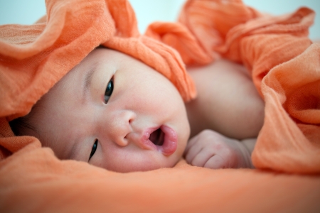Newborn Asian baby girl awake, 7 days after birthの写真素材
