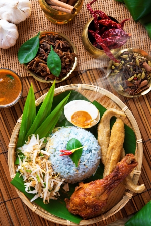 Traditional Malaysian food, Asian cuisine. Nasi kerabu is a type of nasi ulam, popular Malay rice dish. Blue color of rice resulting from the petals of  butterfly-pea flowersの写真素材