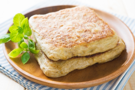 Martabak or murtabak, also mutabbaq, is a stuffed pancake or pan-fried bread which is commonly found in Saudi Arabia,  Yemen, India, Indonesia, Malaysia, Thailand, Singapore, and Brunei.の写真素材