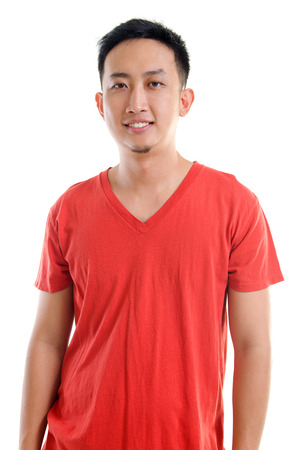 Portrait of young casual Southeast Asian man isolated over white backgroundの写真素材