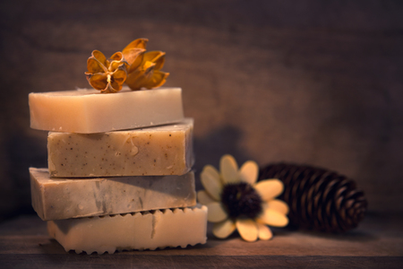 Handmade vegan soap in low light ambient setting.の写真素材