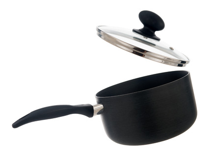 Cooking pot with lid opened, isolated on white backgroundの写真素材