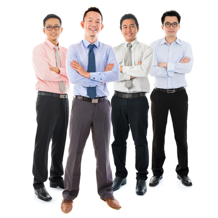 Portrait of group Southeast Asian businessmen standing isolated on white backgroundの写真素材