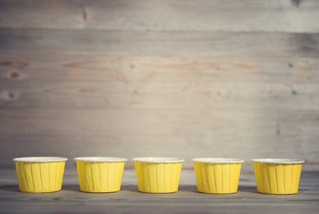 Paper muffin cups isolated on white backgroundの写真素材